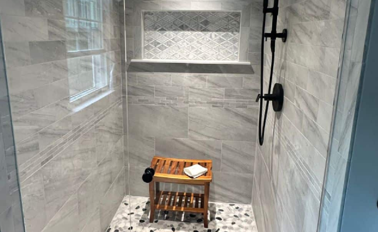 BG-9 A modern kitchen showcasing perfect pairings of kitchen counters and backsplash.