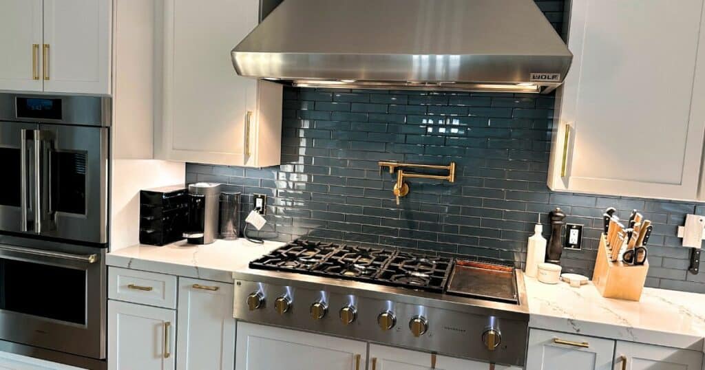 kitchen remodel - modern ranch cabinets - oven - ranch styled range hood